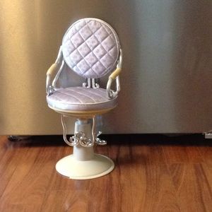 Hardly used doll chair it actually works.